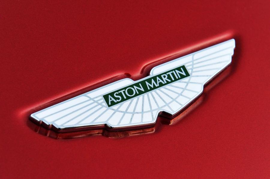 Логотип Aston Martin DB9 2013 года  (NA) (фото 55 из 60)